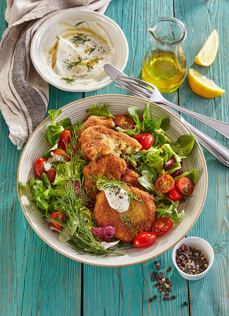 Light salad with fish cakes