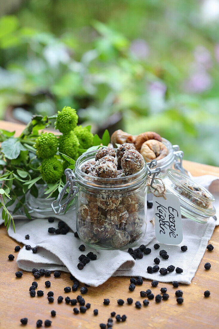 Energy balls made of linseed, coconut, figs and aronia berries