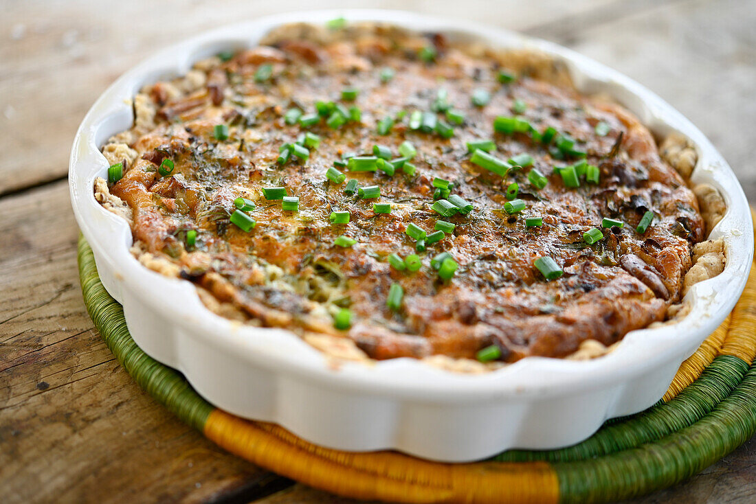 Cheese pie with chanterelles, dill, and chives
