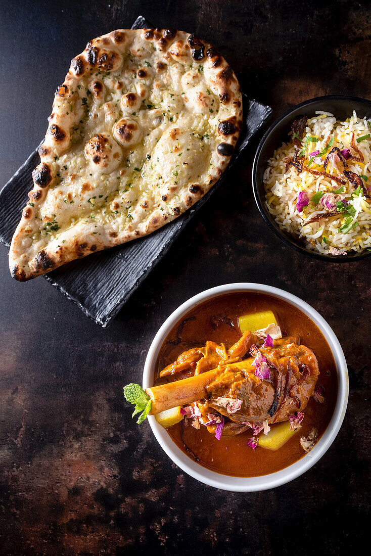 Lamb Nihari (Pakistan slow cooked lamb stew) with flat bread