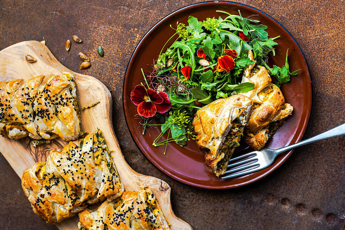Pumpkin, spinach and feta pastry served with salad