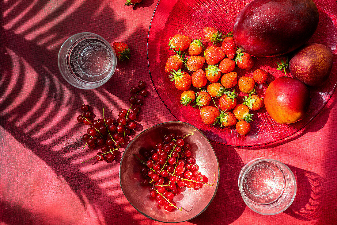 Red currents, strawberries, mango and nectarines