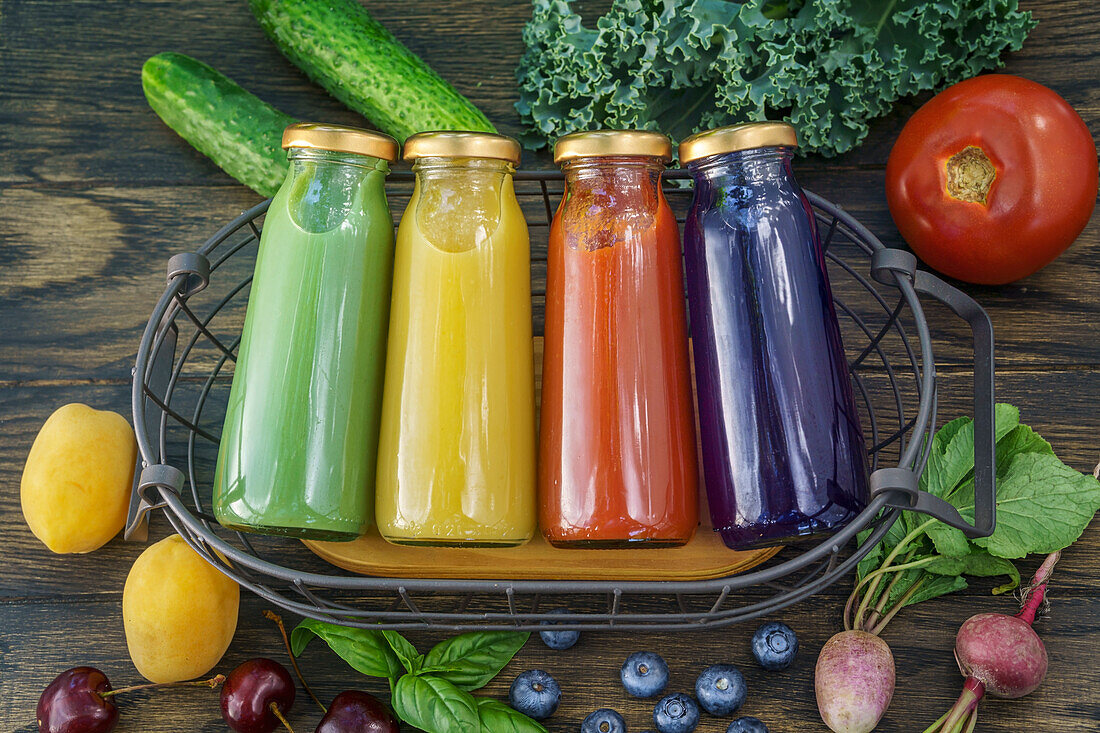 Bottles with different fruit or vegetable juices