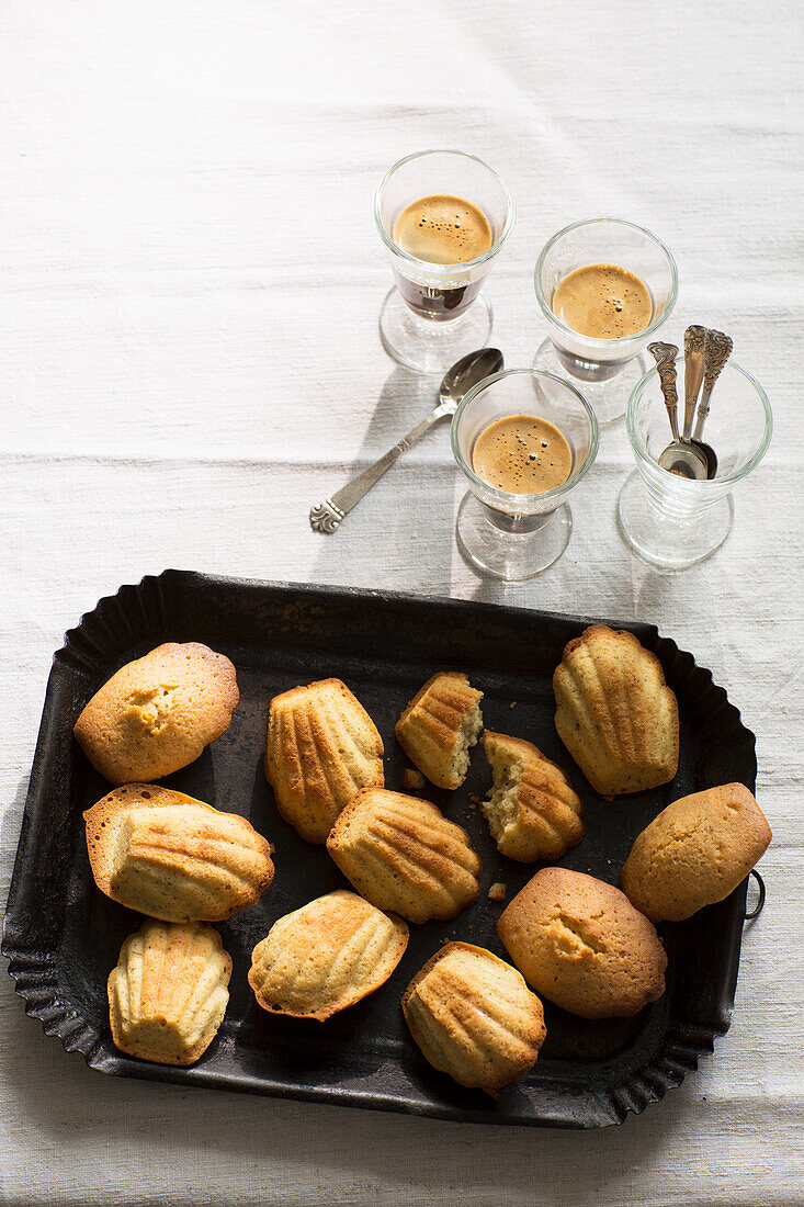 Madeleines served with espresso in glasses