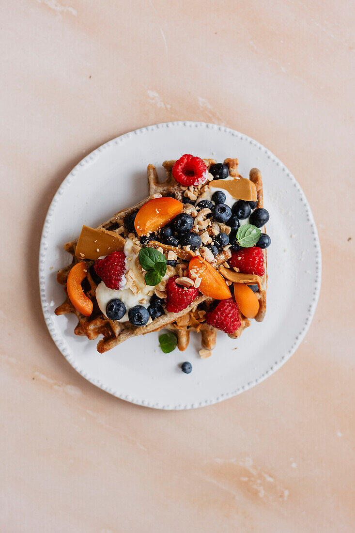 Waffles with summer fruits and brunost