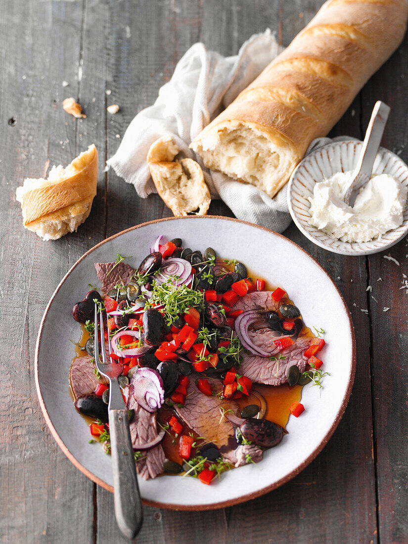 Beef salad with baguette and horseradish cream