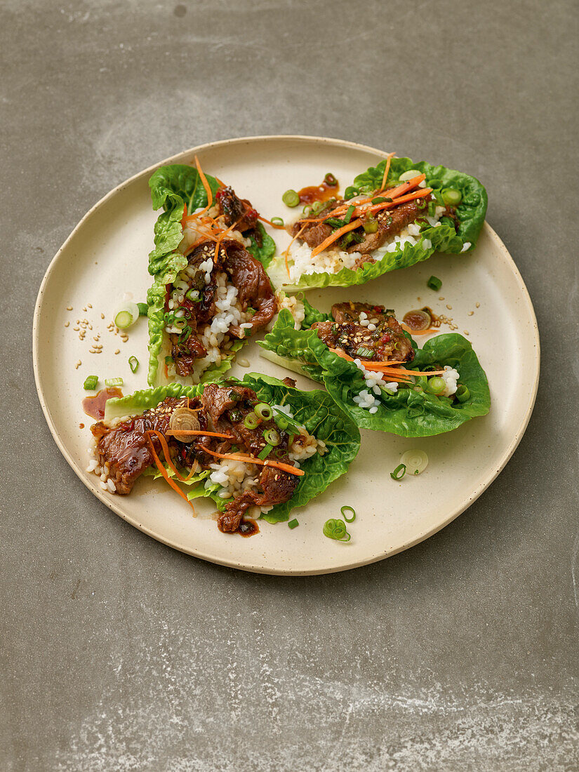 Korean bulgogi salad wraps with beef steaks