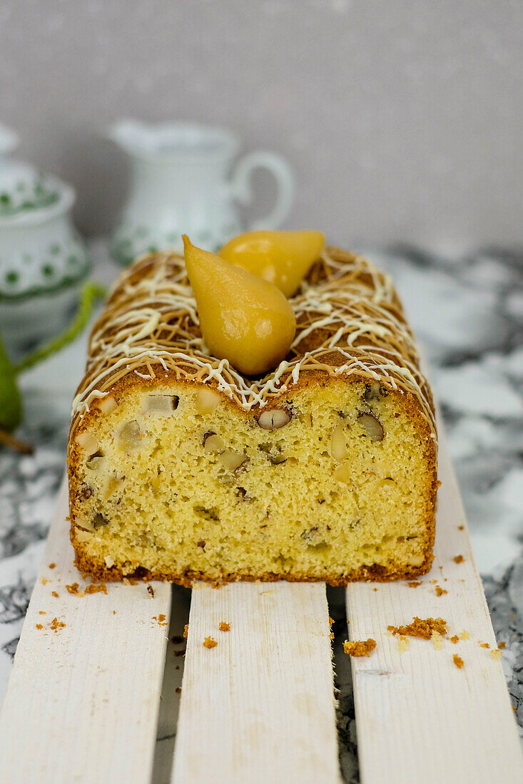 Pear box cake with nuts, sliced
