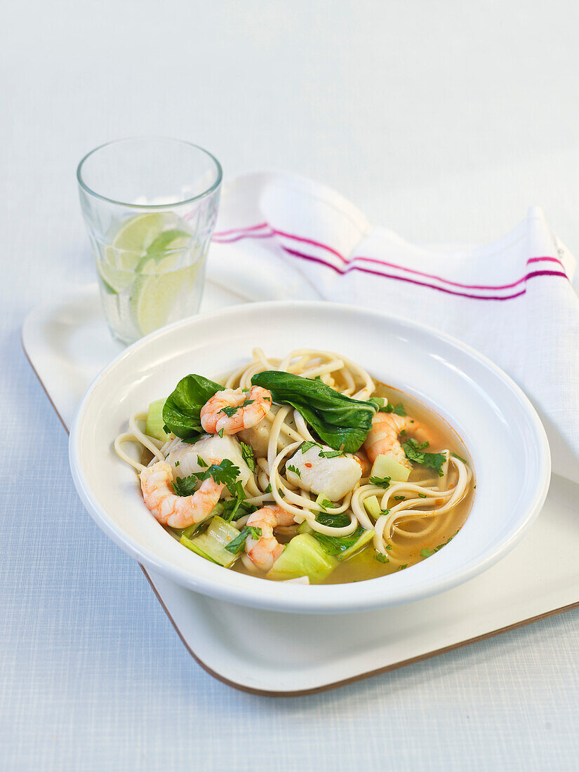 Fish broth Thai style with vegetables and shrimp