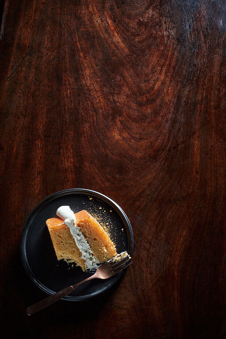 Drizzle Cake with cream frosting in between the layers