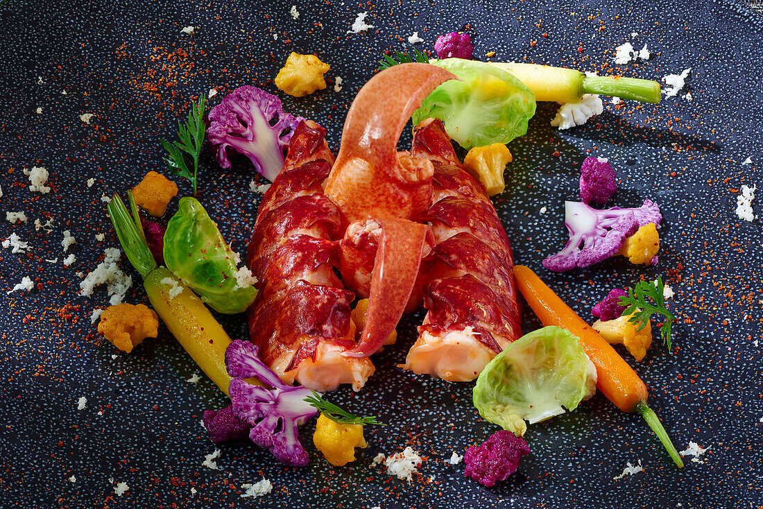 Lobster with carrots, Brussels sprouts and purple cauliflower
