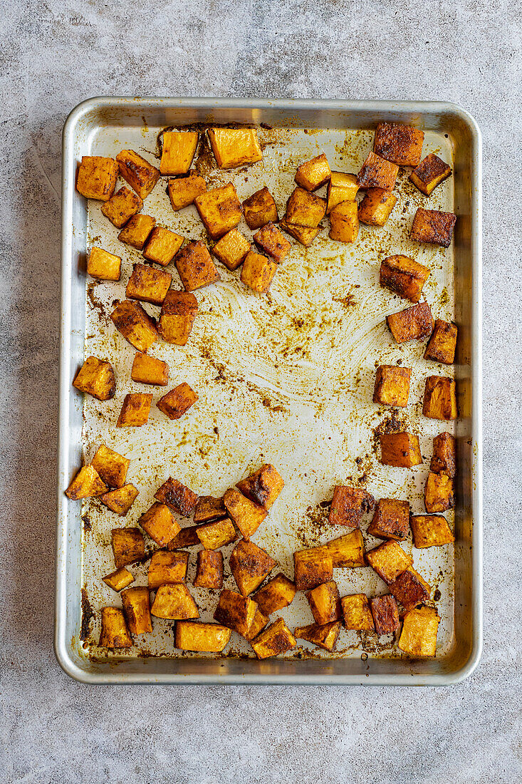 Baked pumpkin cubes with curry powder