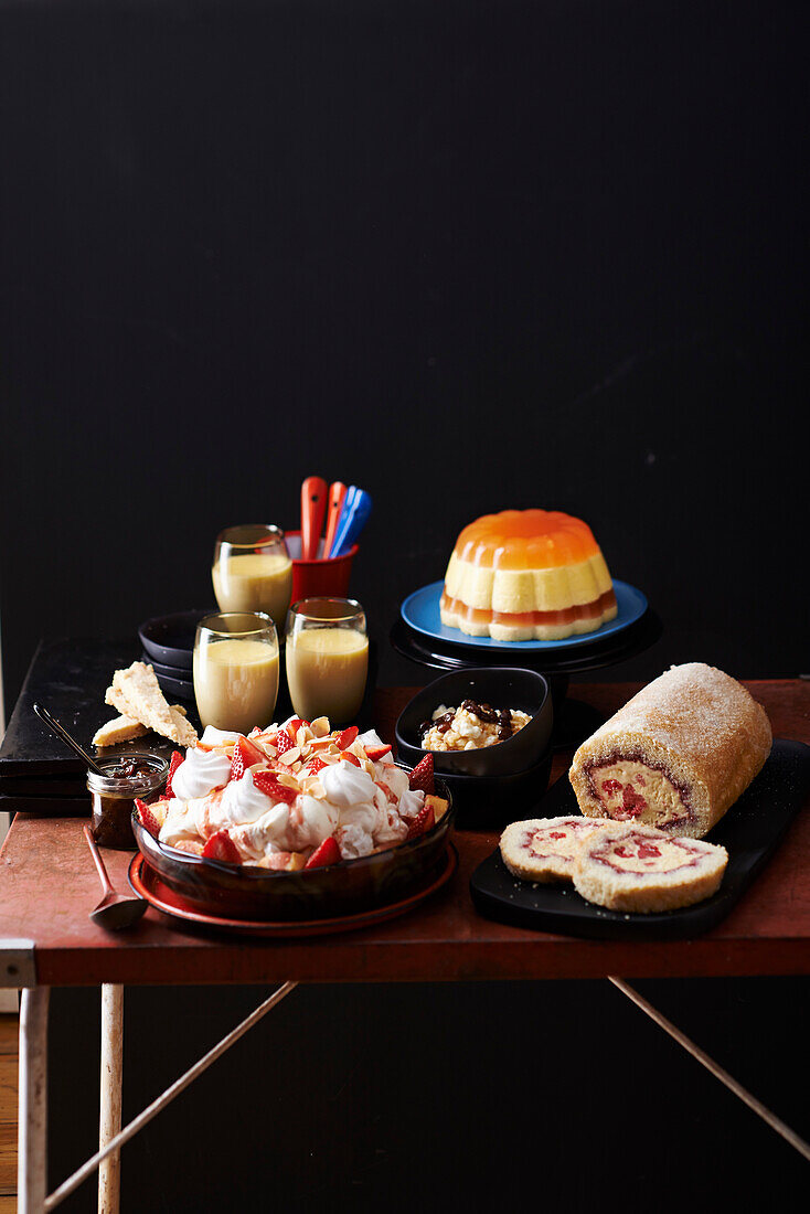 Sponge cake roll, Eton Mess Triffle, Lemon Posset, and rhubarb pudding with jelly