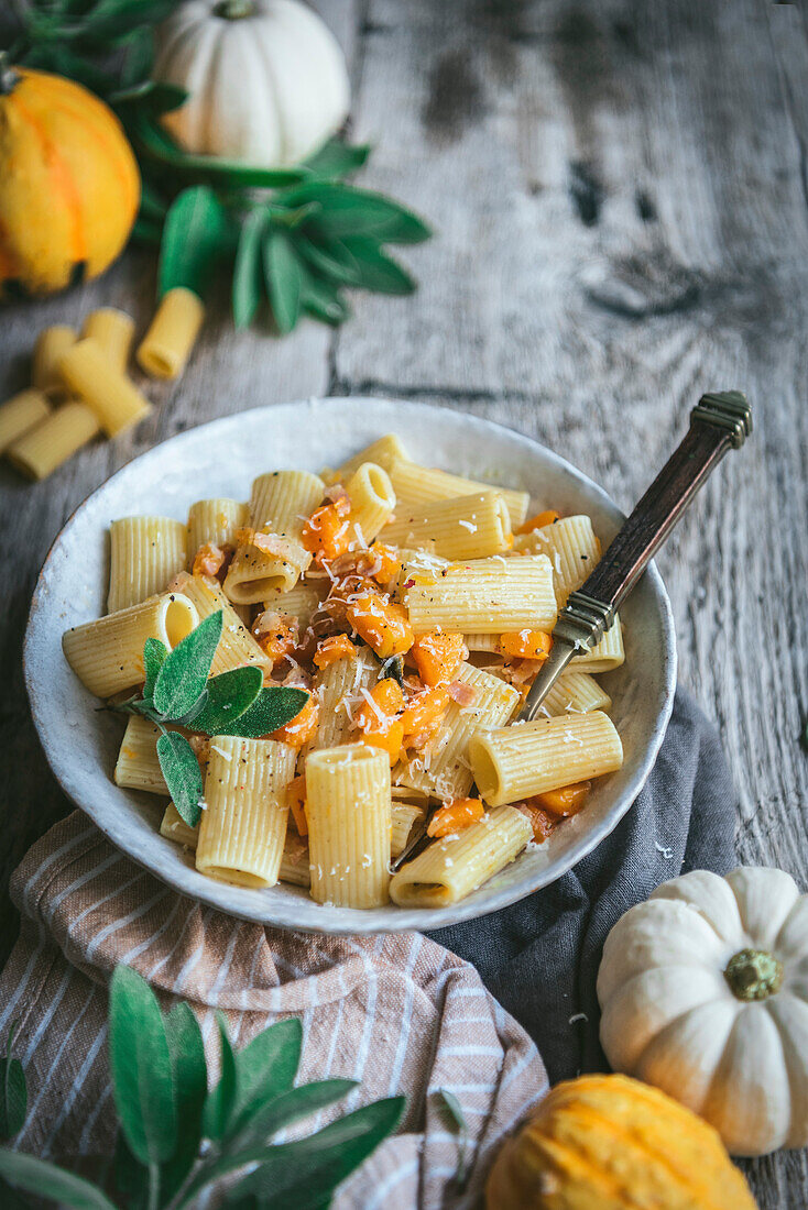 Butternut squash pancetta rigatoni pasta in a bowl