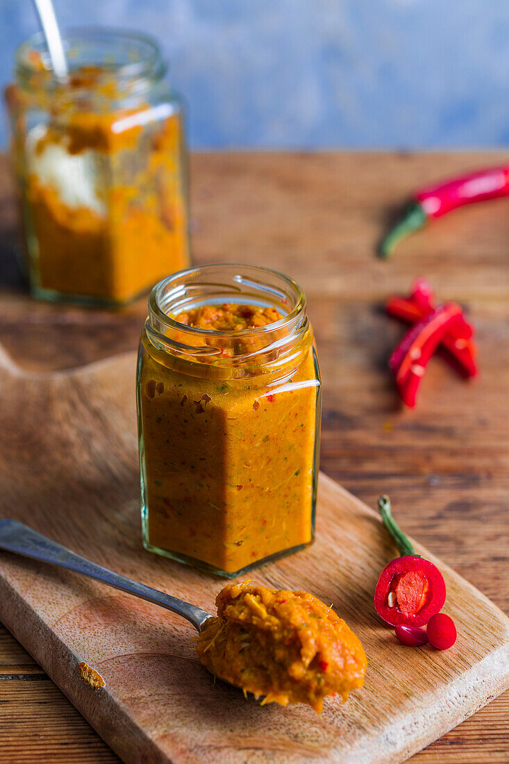 Jar of homemade Thai red curry paste