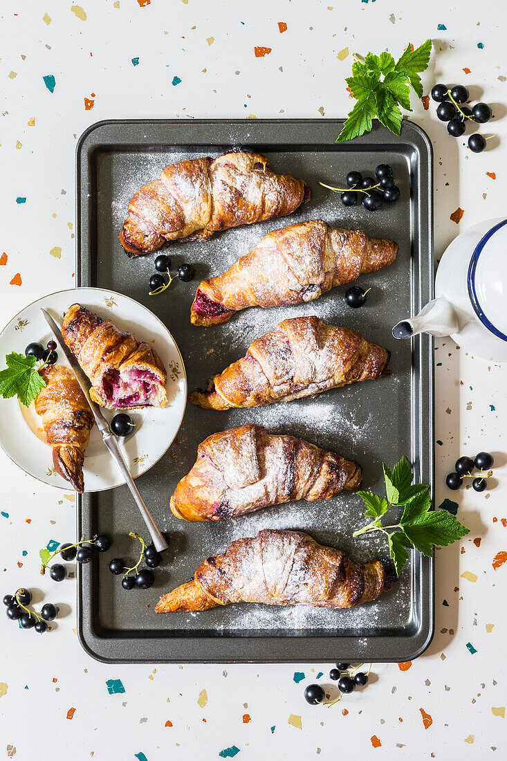 Puff pastry croissants with fresh blackcurrant filling
