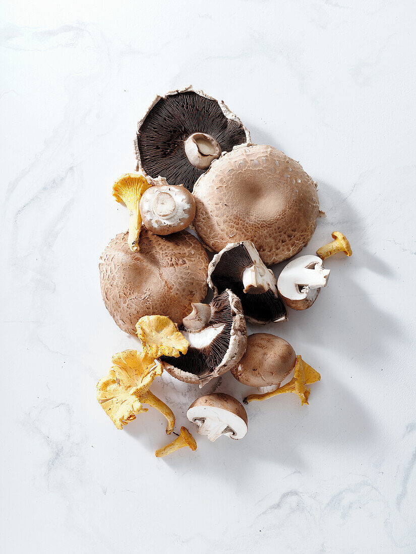 Top view with portobello mushrooms on marble tabletop