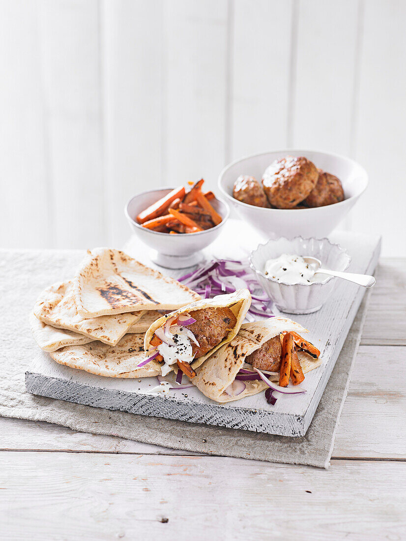 Pitta with harissa turkey kebabs and carrots