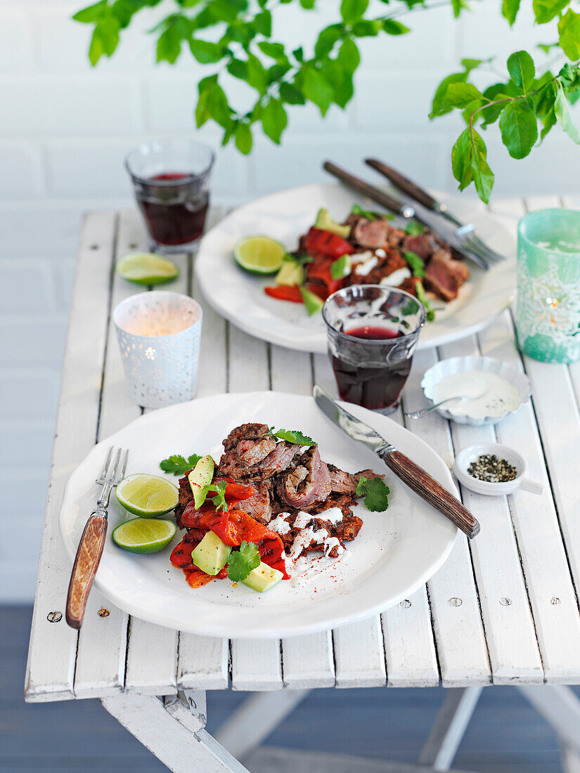 Mexican steak with homemade bean puree on the garden table