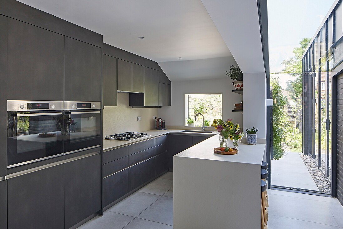 Kitchen with glazed link to dining area