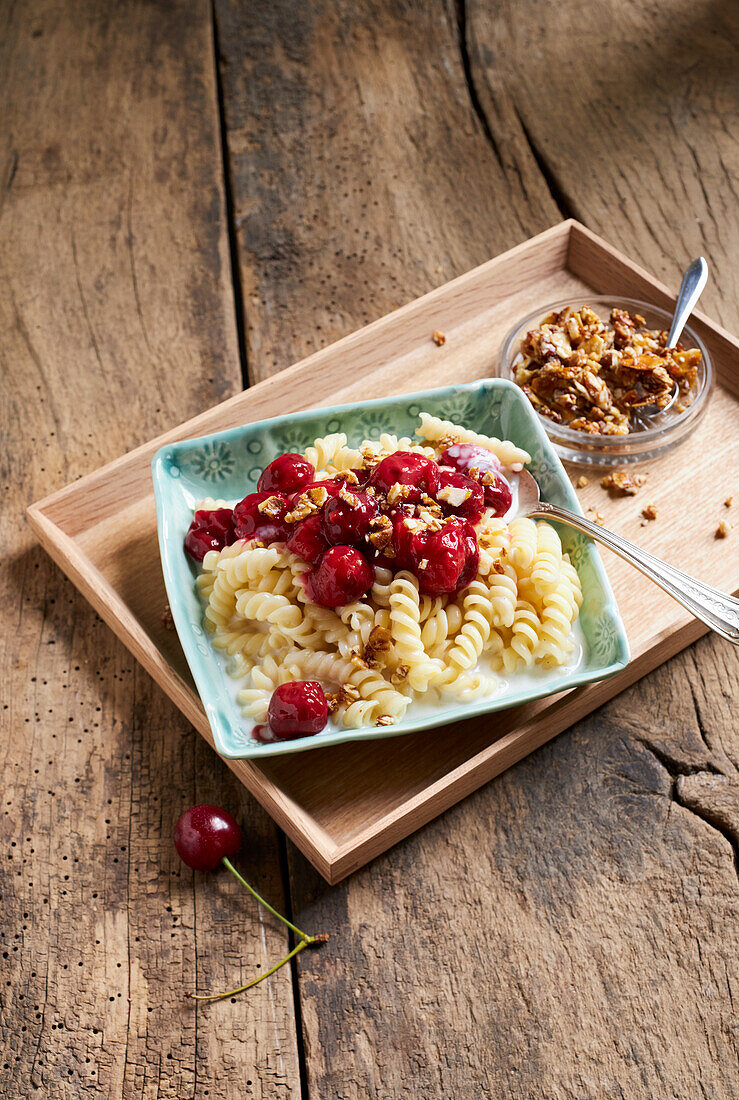 Sweet milk pasta with cherries