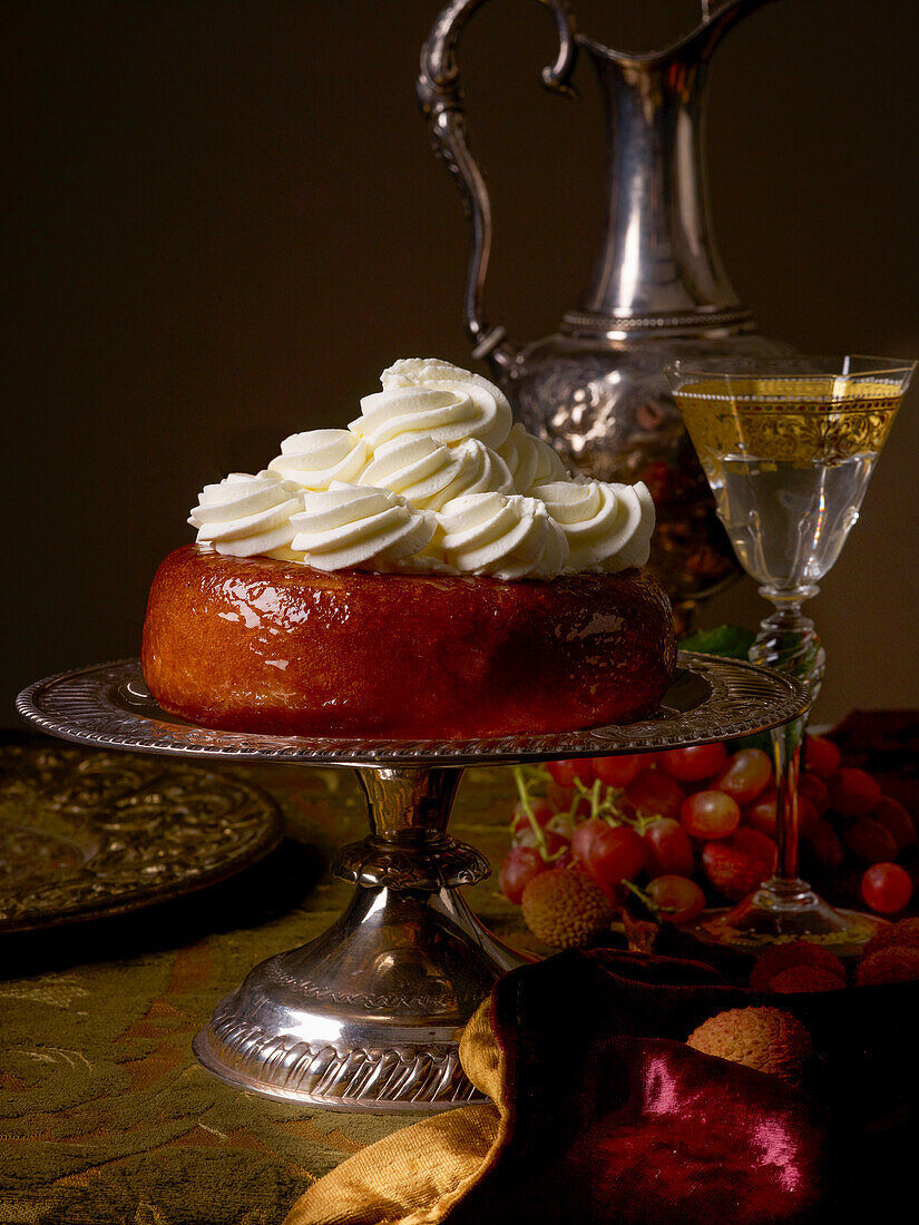 Baba au rhum with cream