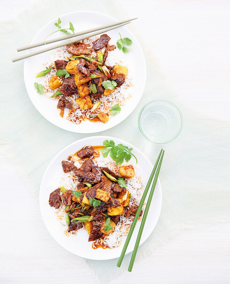 Stir Fry with beef, pineapple and ginger on rice (Asia)