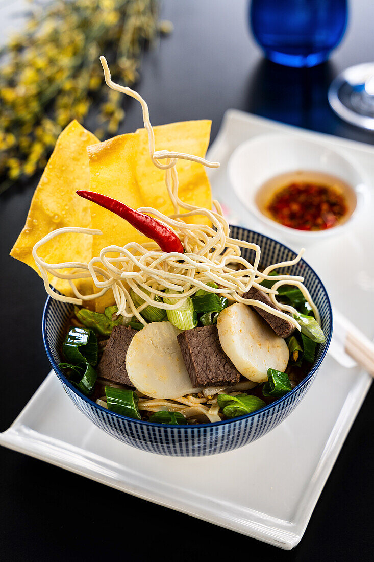 Oriental noodle dish with beef and celery