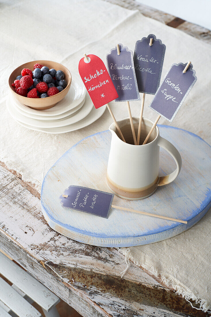 Menu cards on wooden skewers