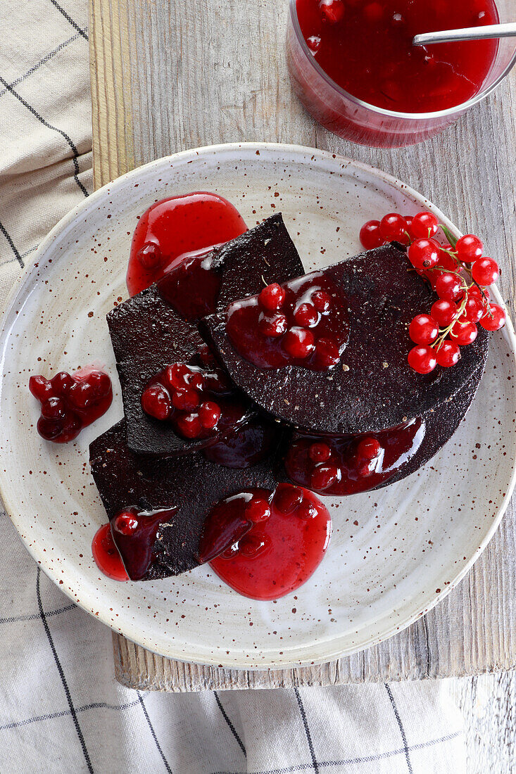 Blood pudding (Sweden) with redcurrant sauce