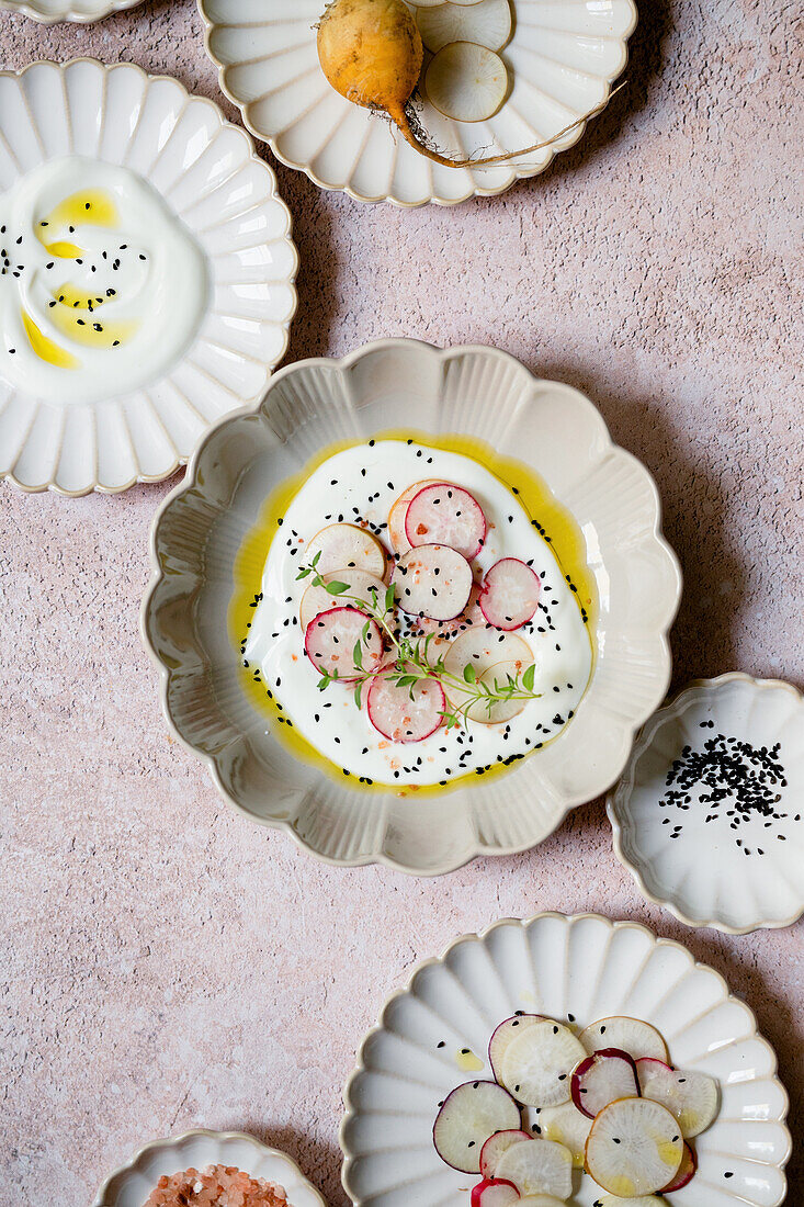 Feta cream with black cumin, radish, and olive oil