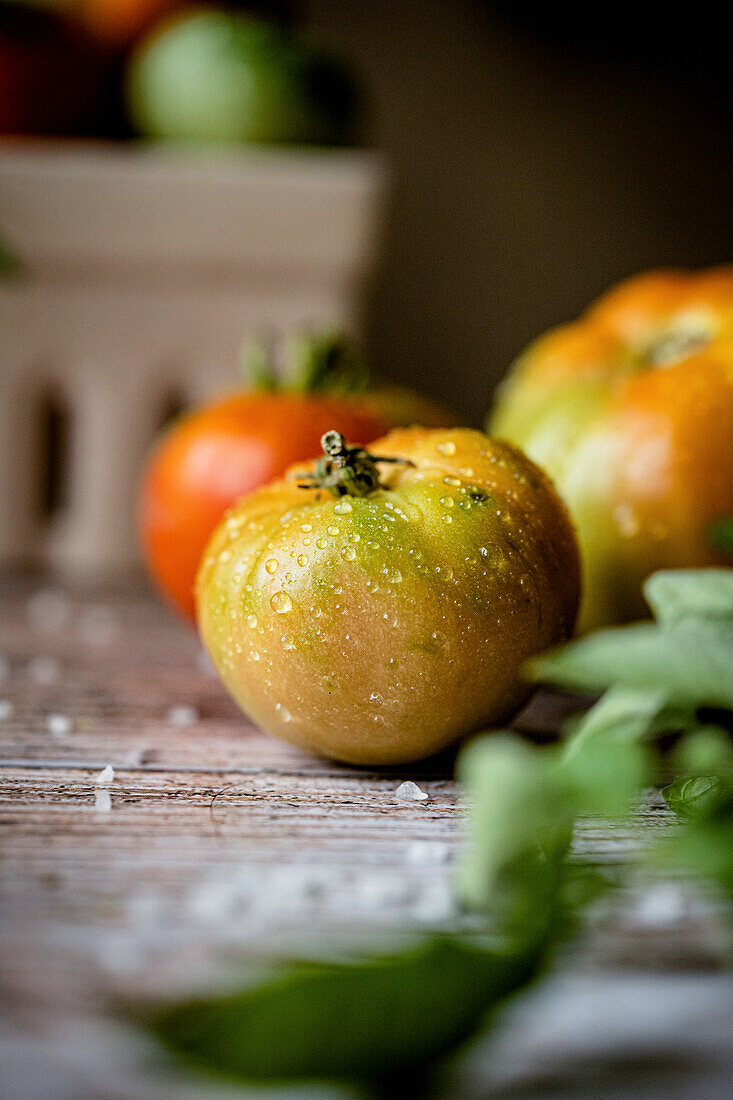 Fresh tomatoes with water drops