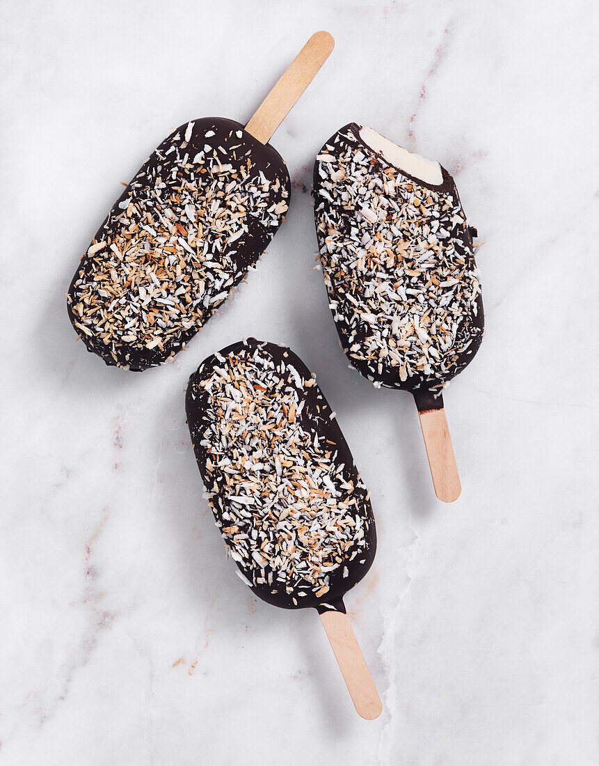 Homemade ice cream pop with coconut and chocolate
