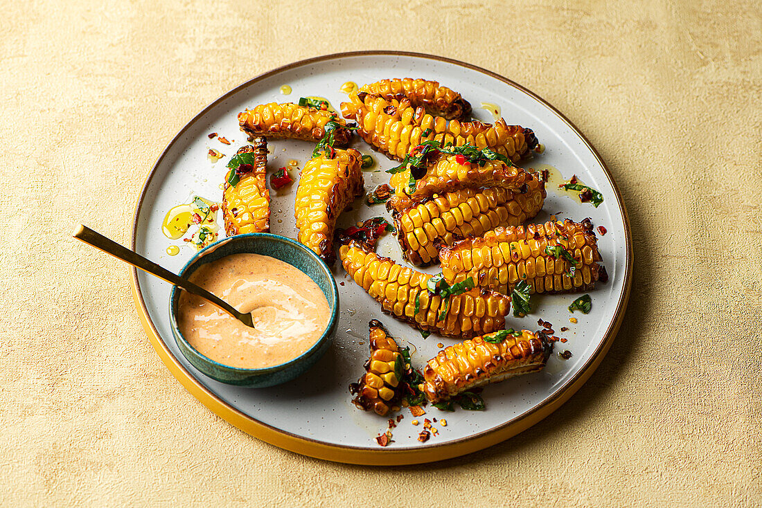 Corn ribs with chilli oil and siracha mayo