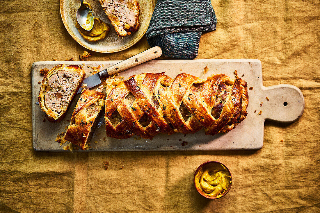Giant apricot and fennel sausage roll