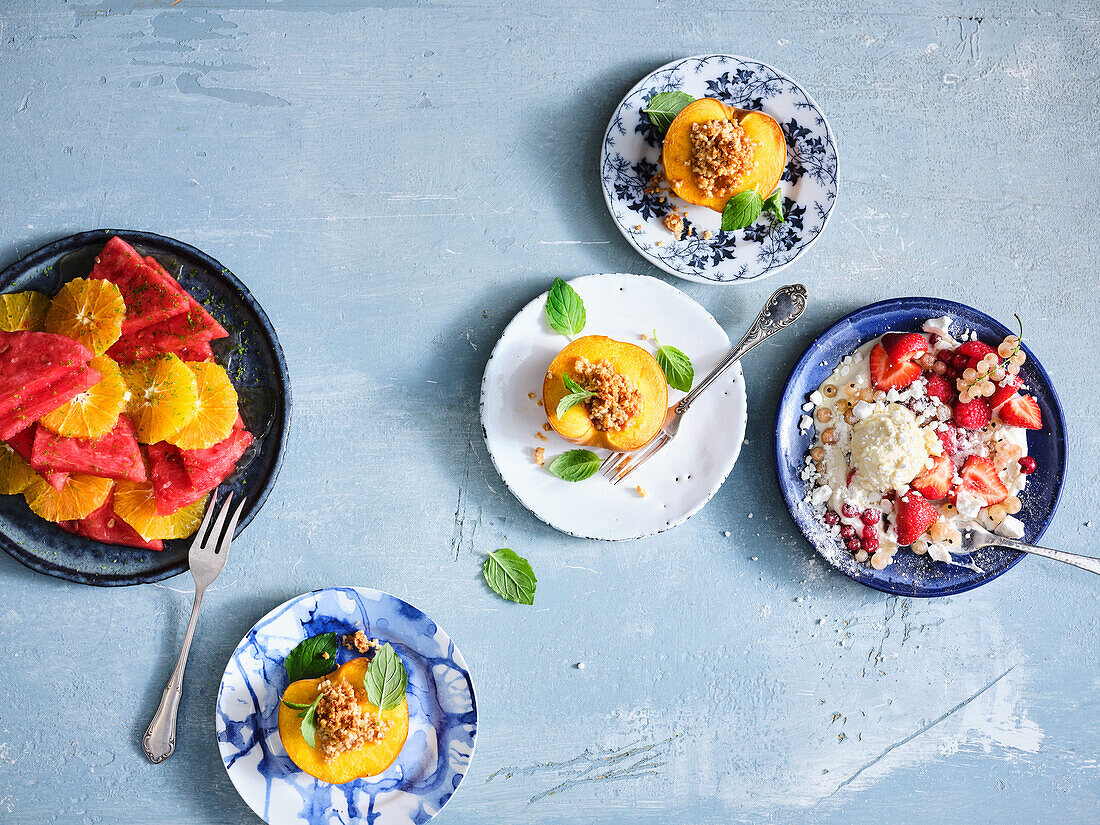 Watermelon and orange salad, Eton Mess and baked peach halves