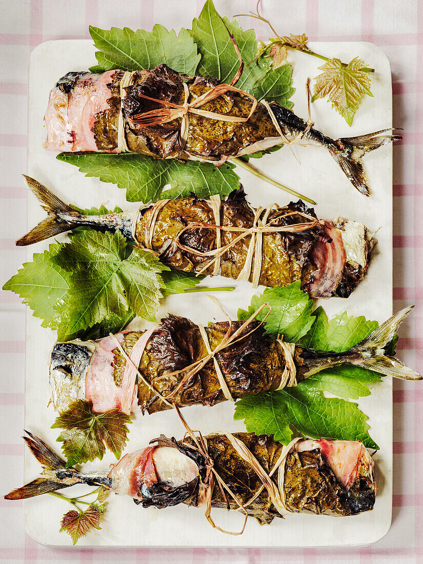 Grilled Mackerel wrapped in Vine laeves