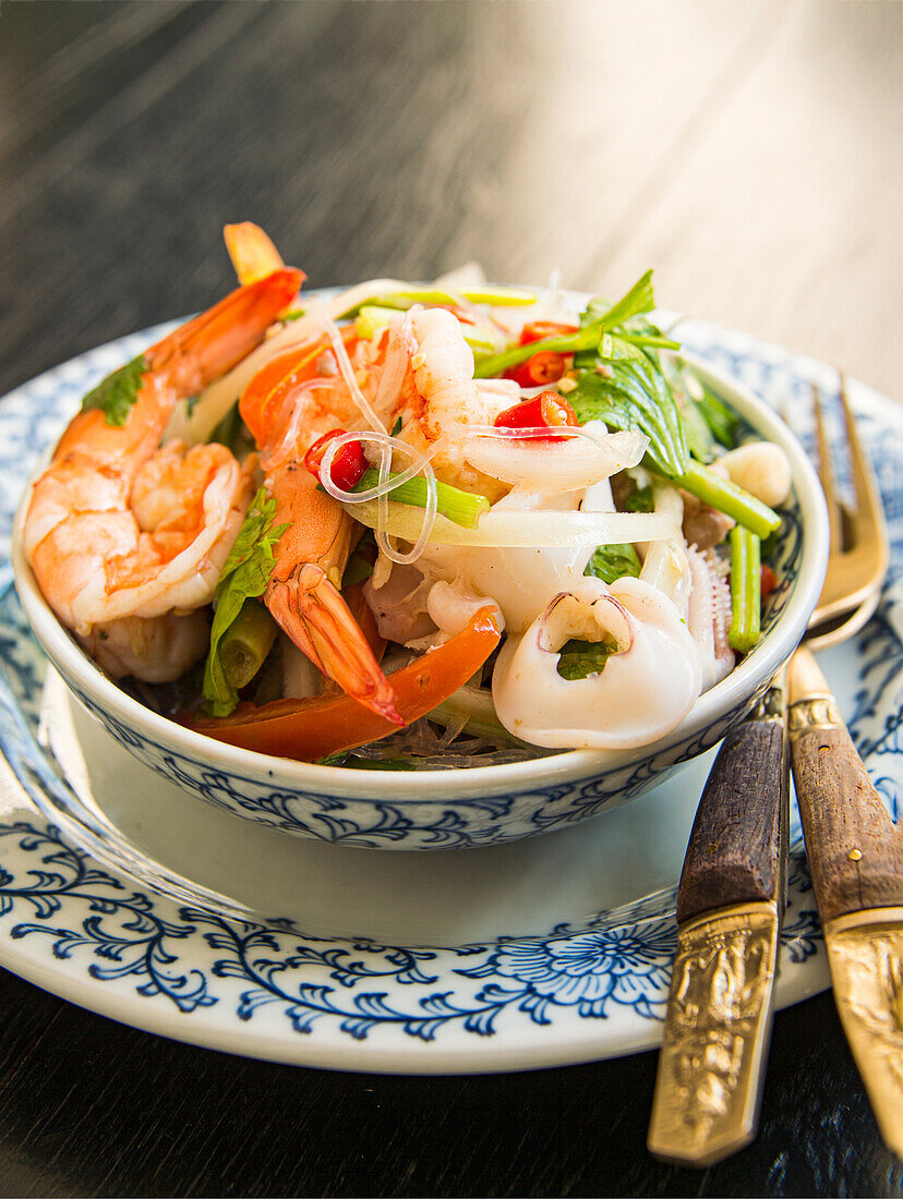 Thai seafood salad with shrimp, crab, and squid