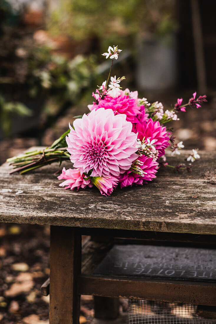 Dahlias on a rustic wooden table