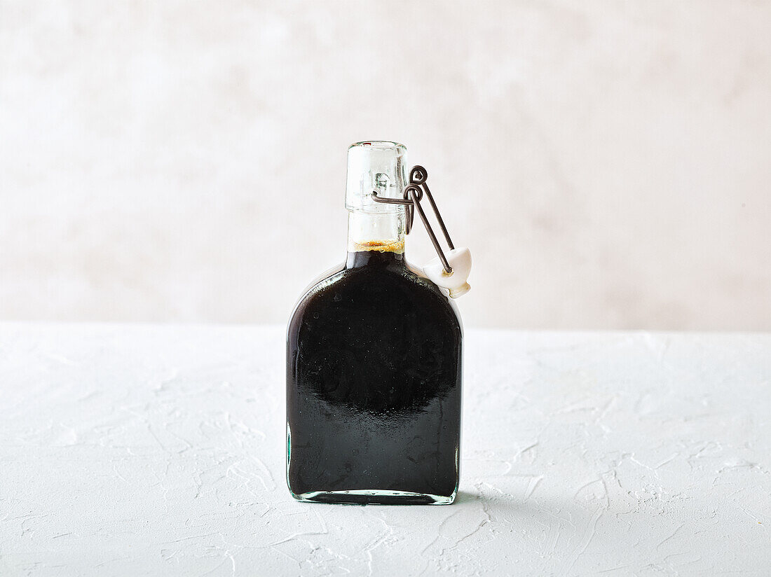 Coffee syrup in a glass flask