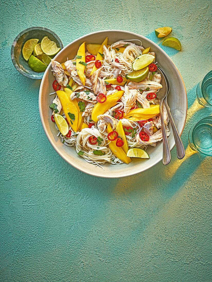 Noodle salad with chicken, mango and chilies