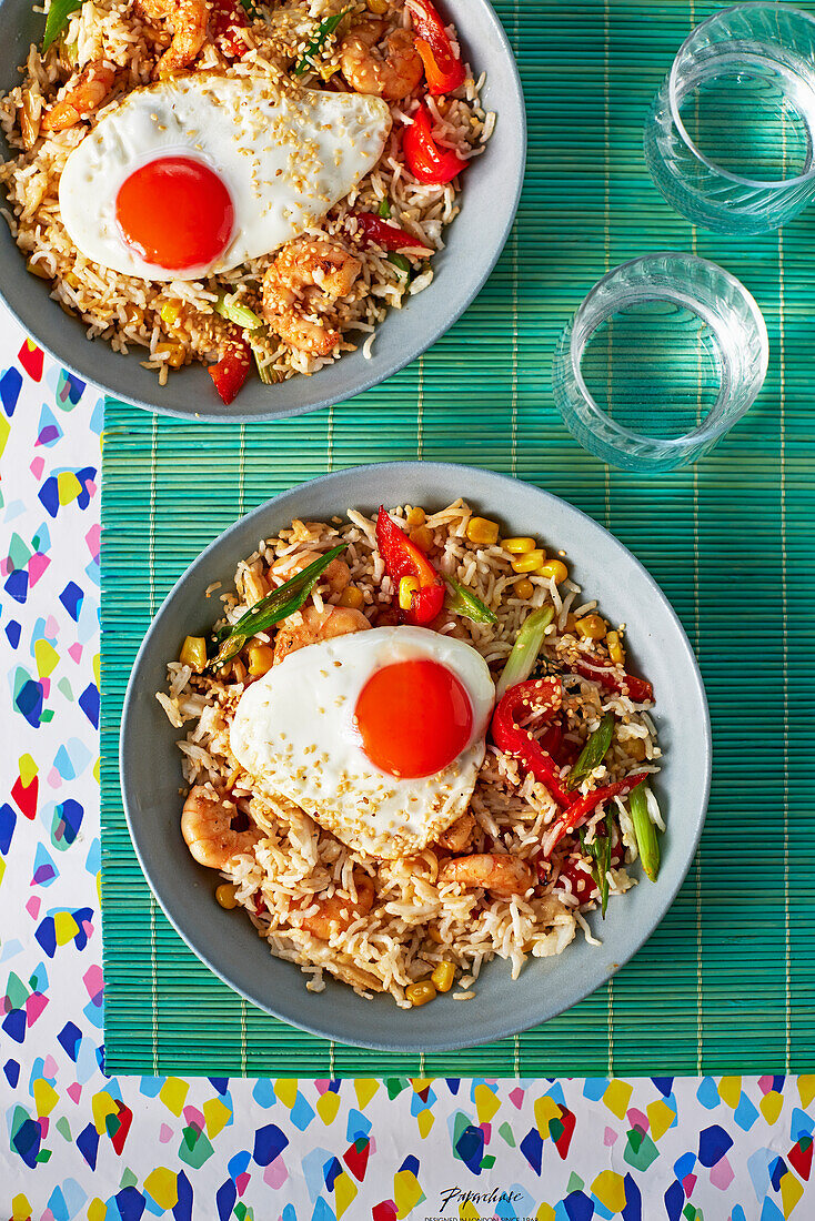 Colorful fried rice with shrimp and fried egg