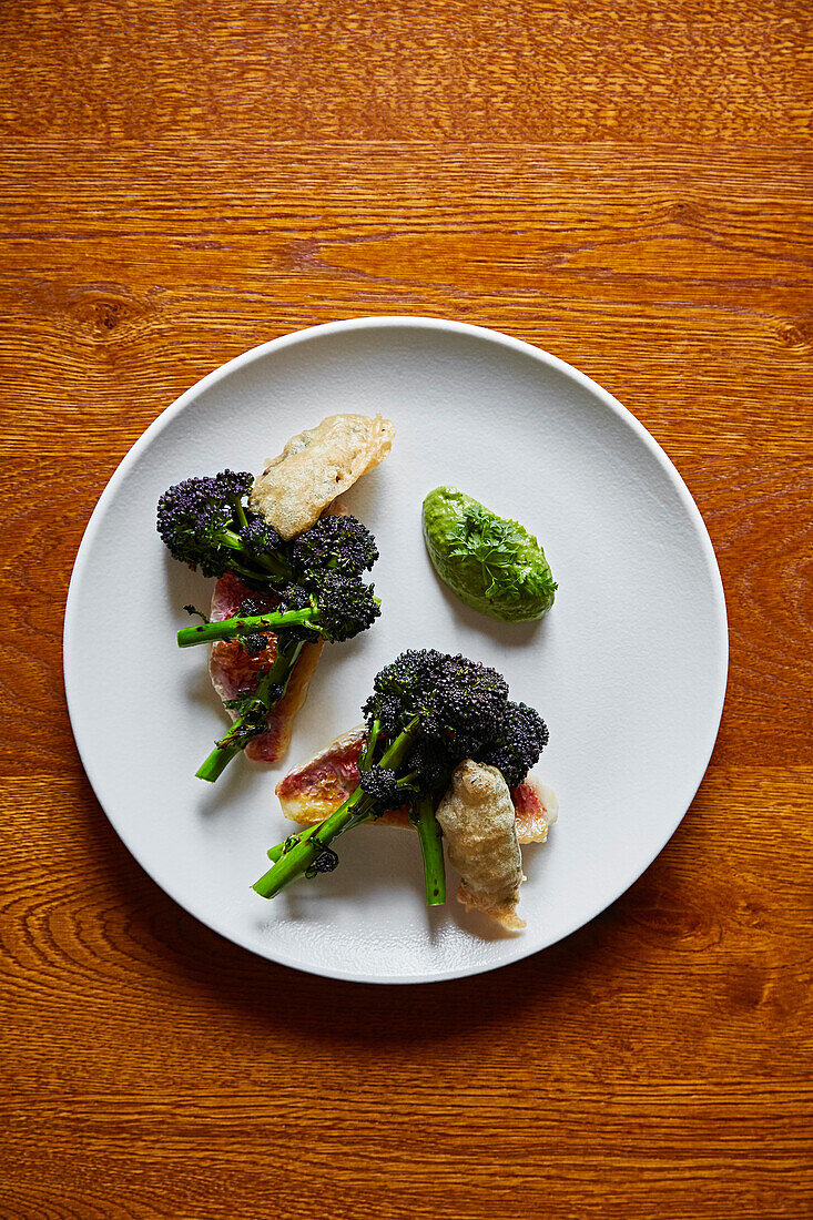 Red mullet served with tempura vegetables