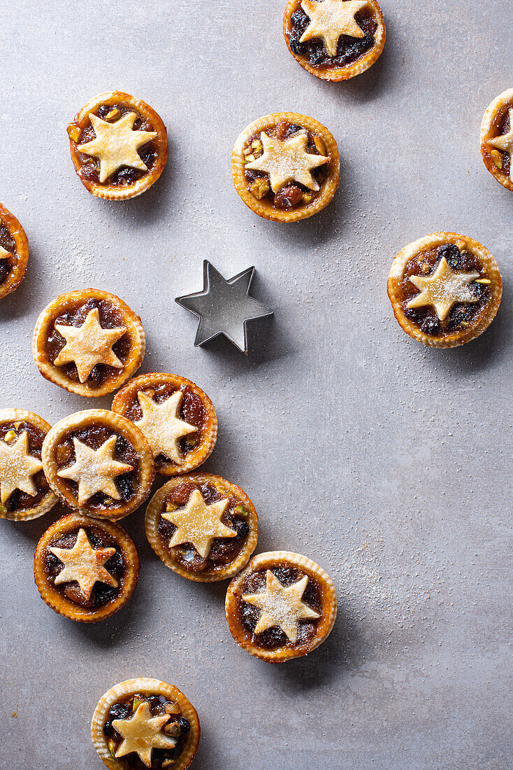 Mince pies on a grey background