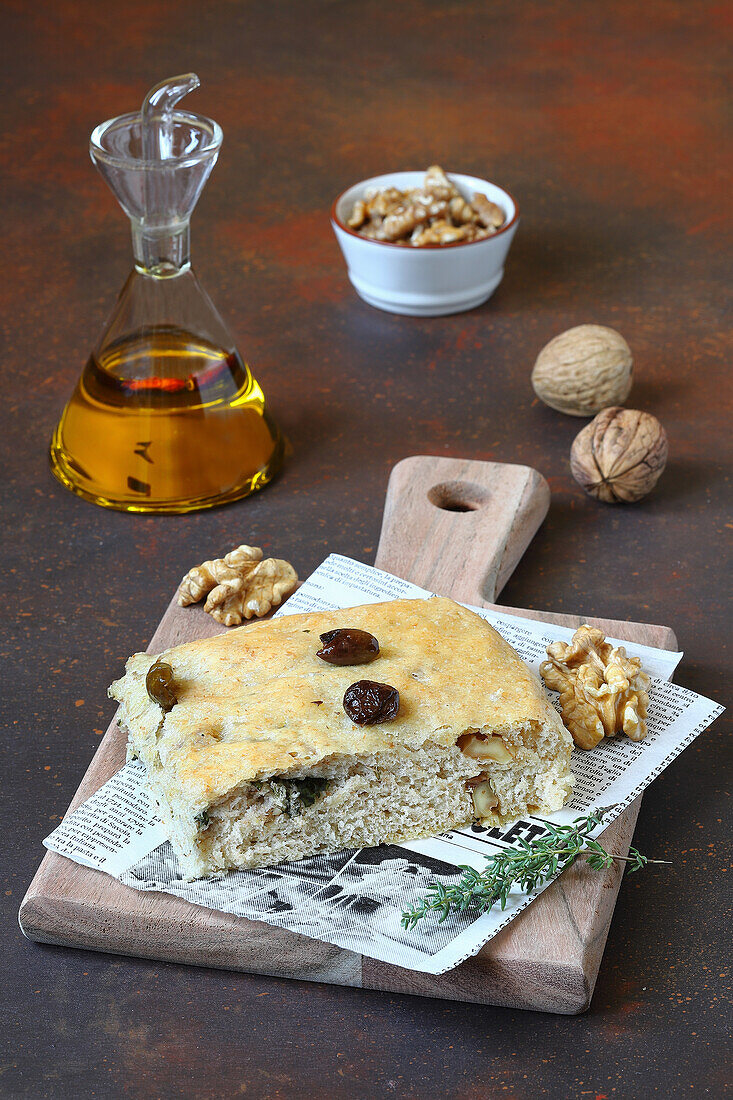 Focaccia with black olives thyme and walnuts