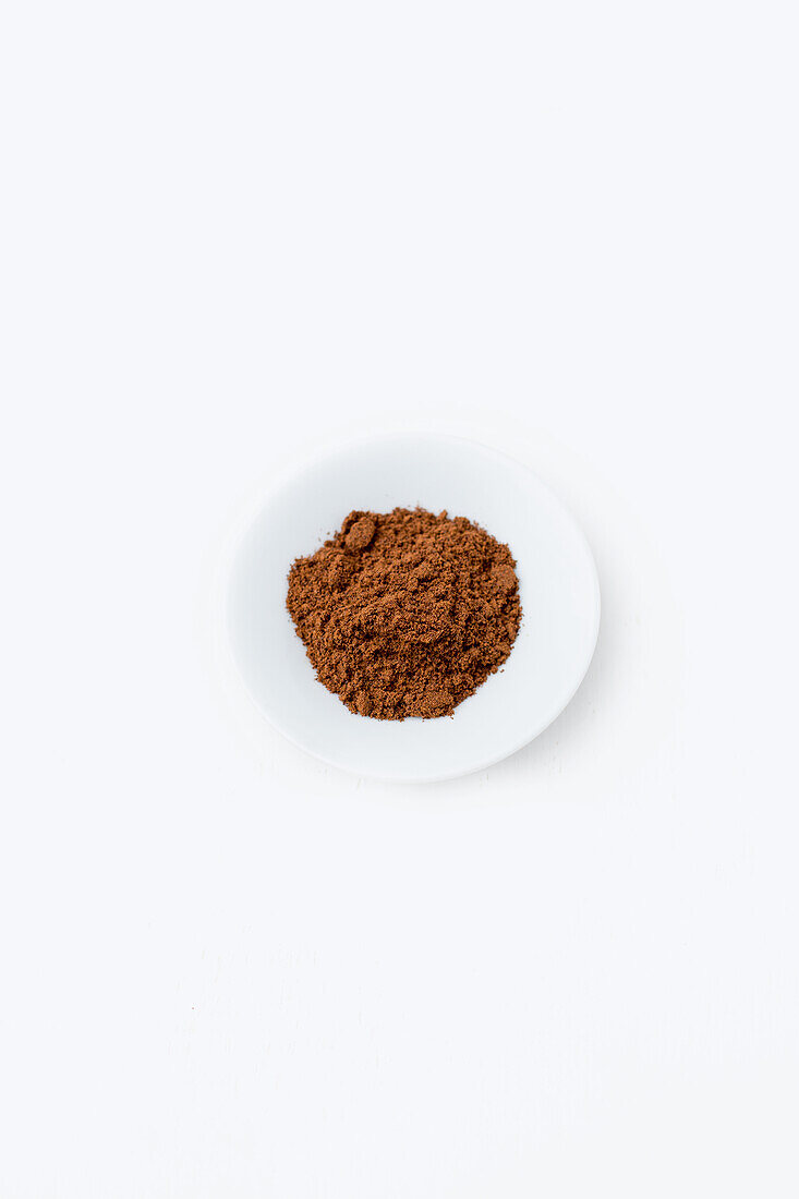 Ground cloves on small plate