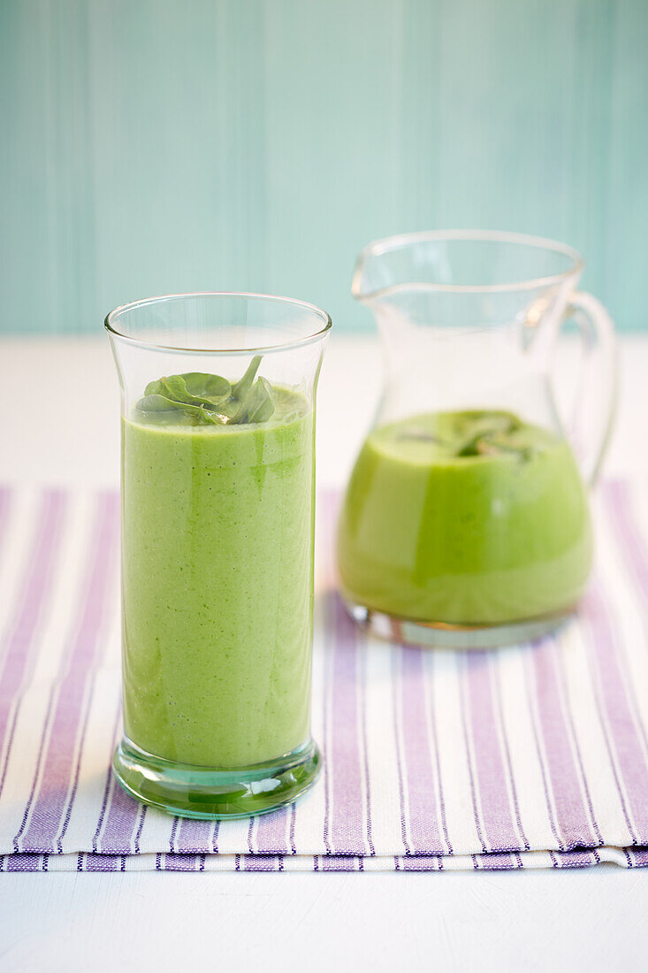 Green spinach smoothie with vegan plant milk