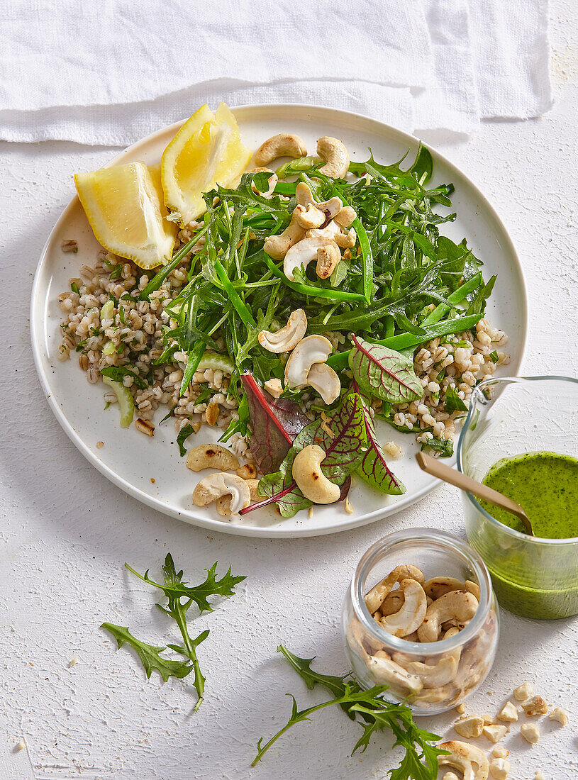 Barley groats with rocket salad and cashew nuts