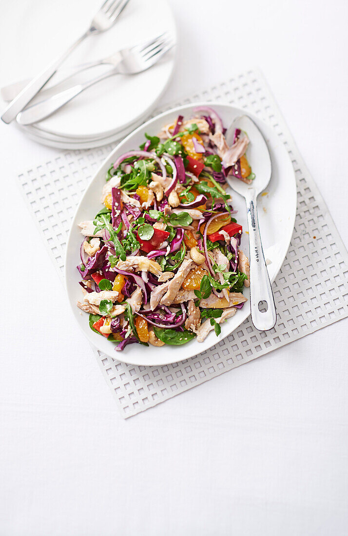 Asian chicken and tangerine salad with cashew nuts