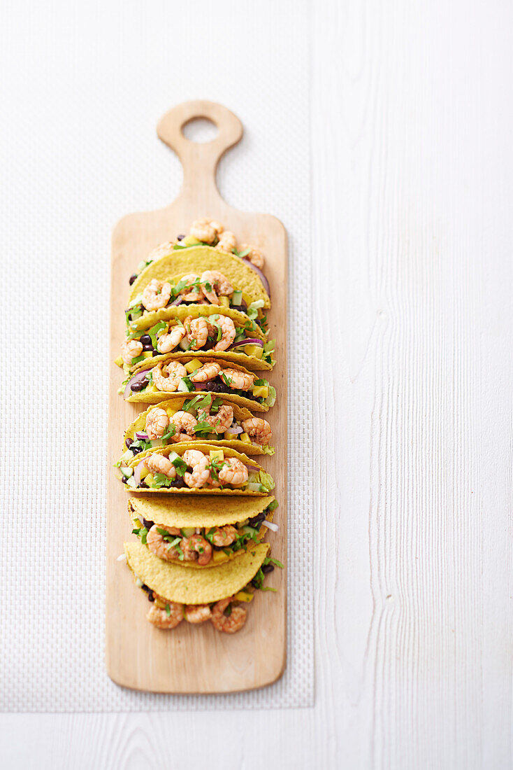 Spicy jerk prawn tacos with mango and coconut dressing